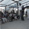 Jean-Robert encourages Haitians to send children in restavek to group and recreational activities in the tent camps.